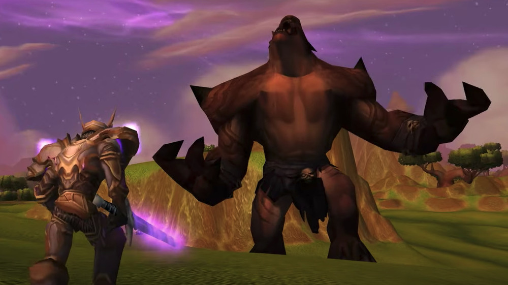 player fights large beast