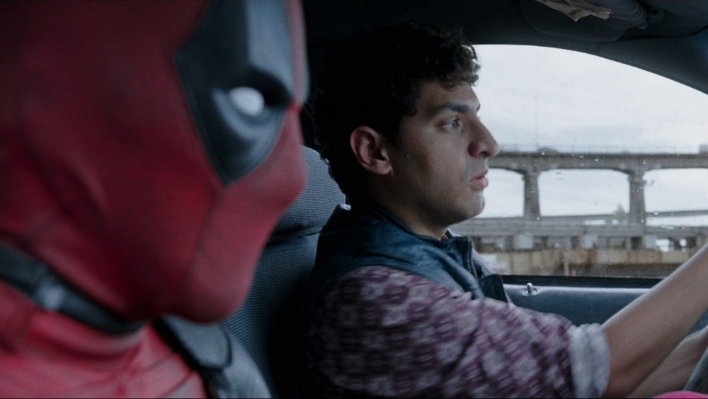 Deadpool and Dopinder in a cab
