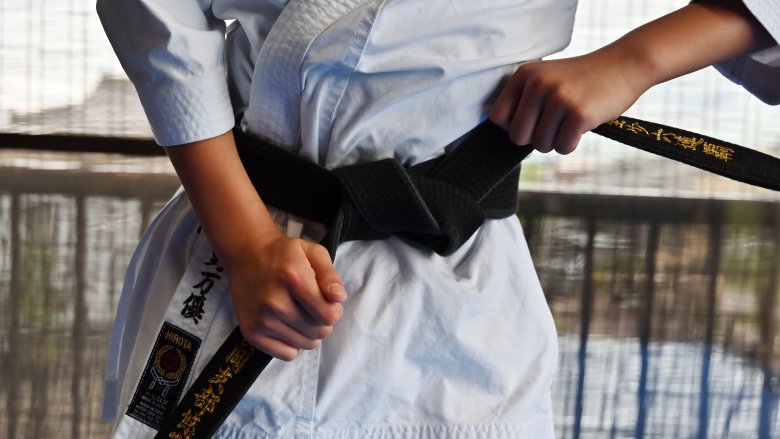Man wearing black belt