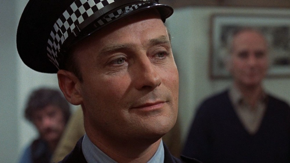 Edward Woodward as Sergeant Howie