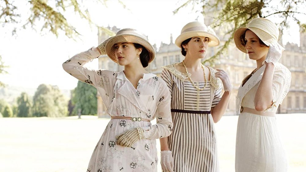 Jessica Brown Findlay as Sybil, Laura Carmichael as Edith, and Michelle Dockery as Mary in Downton Abbey