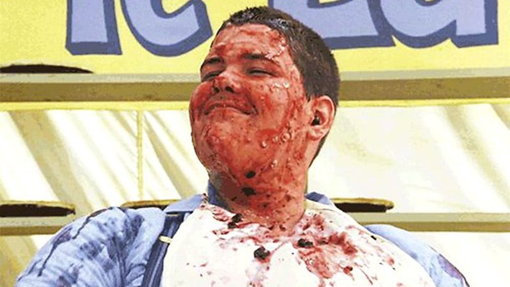 Davie Hogan covered in pie