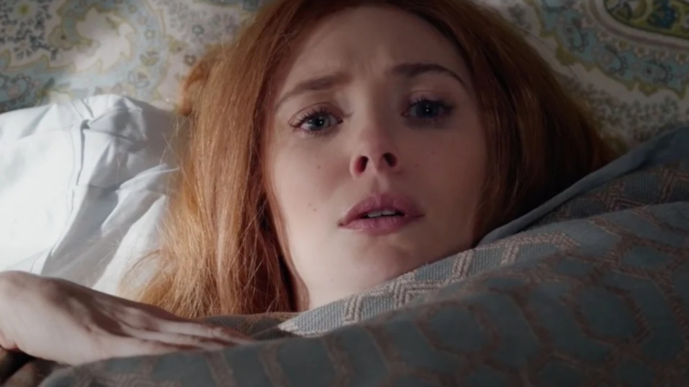 Wanda laying in bed