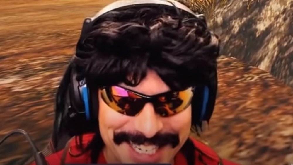 Dr. Disrespect grins at the camera